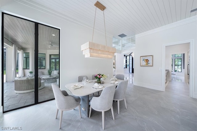 dining space with tile floors, wood ceiling, and crown molding