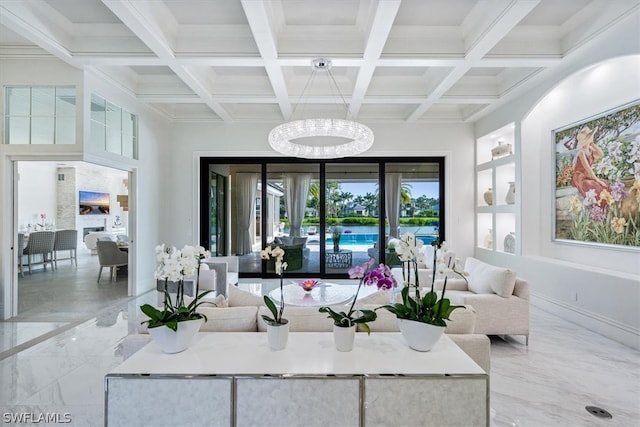 tiled living room featuring a notable chandelier, coffered ceiling, and beam ceiling