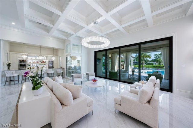 living room with beam ceiling, a notable chandelier, coffered ceiling, and tile floors