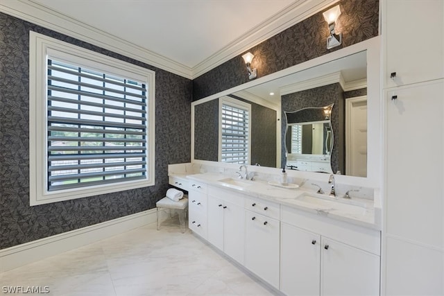 bathroom featuring tile floors, plenty of natural light, crown molding, and large vanity