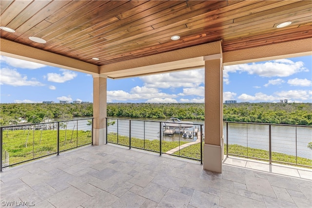 view of patio featuring a water view