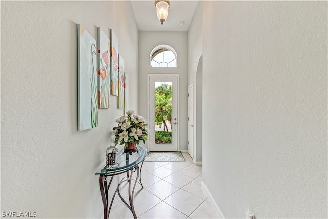 entryway featuring light tile patterned floors