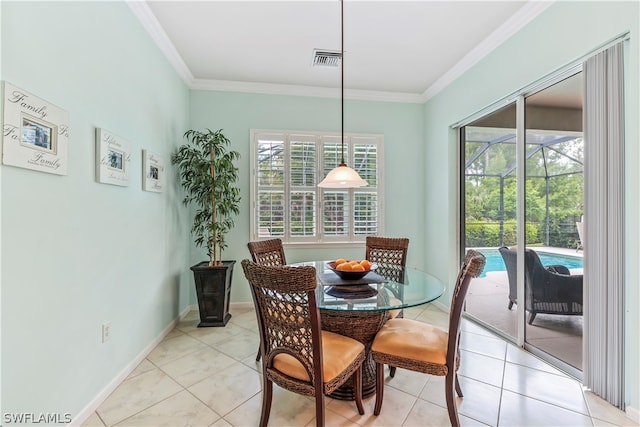 tiled dining space with crown molding