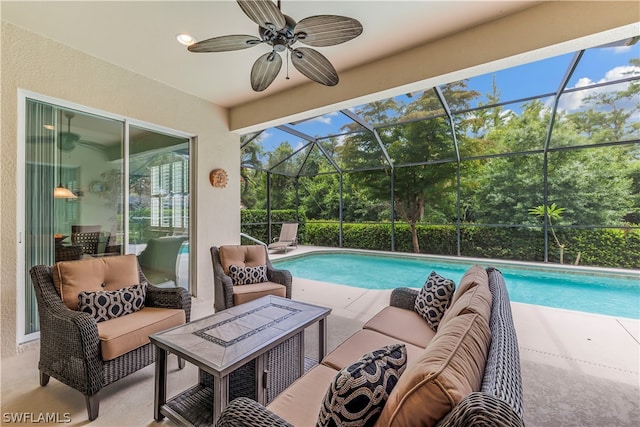 view of swimming pool with a lanai, a patio area, and an outdoor hangout area