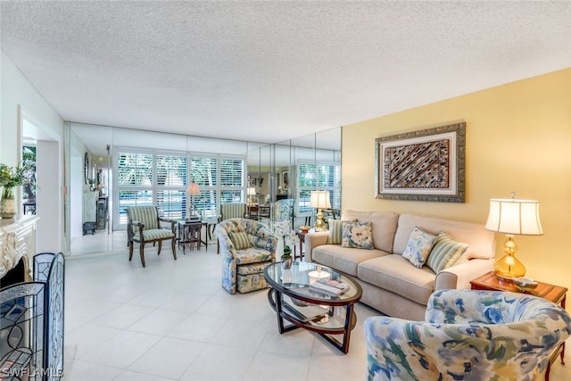 living room featuring a fireplace and a textured ceiling