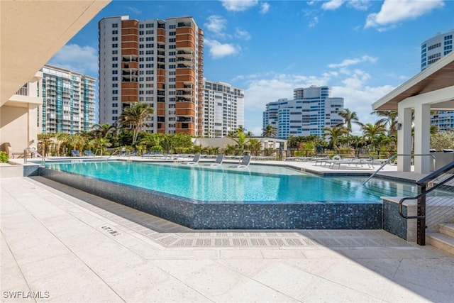 view of pool with a patio