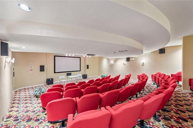 cinema room with carpet flooring