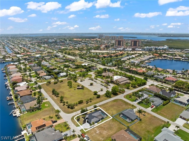 drone / aerial view with a water view