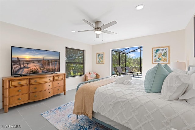 bedroom featuring light tile patterned flooring and ceiling fan