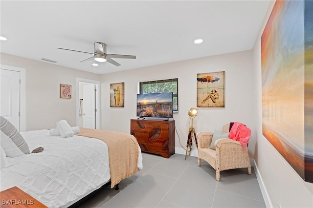 tiled bedroom featuring ceiling fan