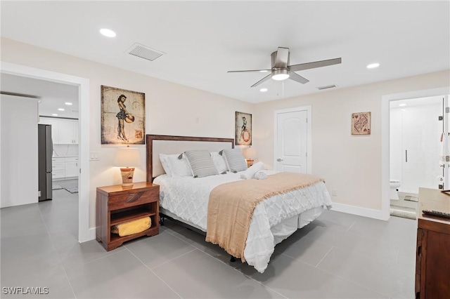 bedroom featuring tile patterned flooring, connected bathroom, stainless steel fridge, and ceiling fan