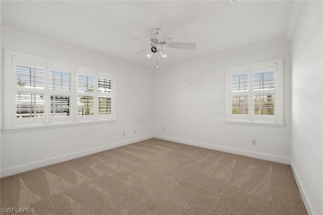 unfurnished room with carpet, ceiling fan, and ornamental molding