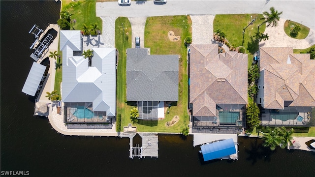 bird's eye view with a water view