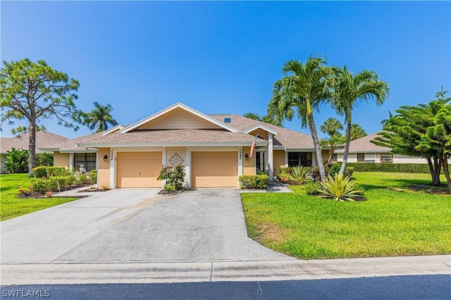 single story home with a front lawn and a garage