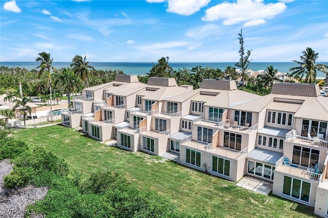 drone / aerial view featuring a water view