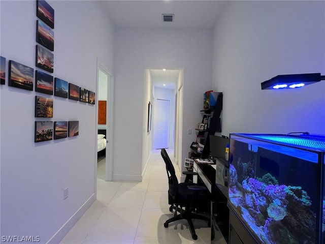 home office with light tile flooring