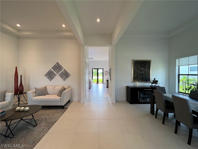 tiled living room featuring plenty of natural light