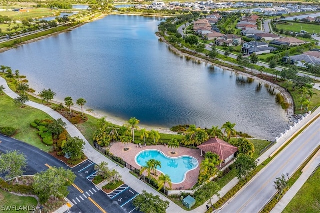 bird's eye view with a water view