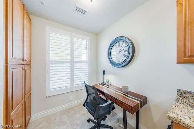 office with light tile floors