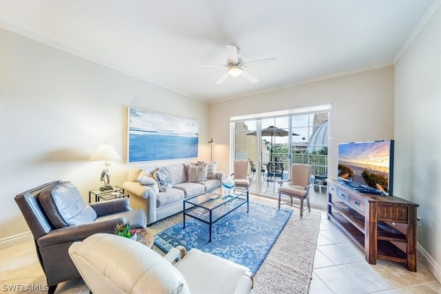 living room with ornamental molding, ceiling fan, and light tile floors