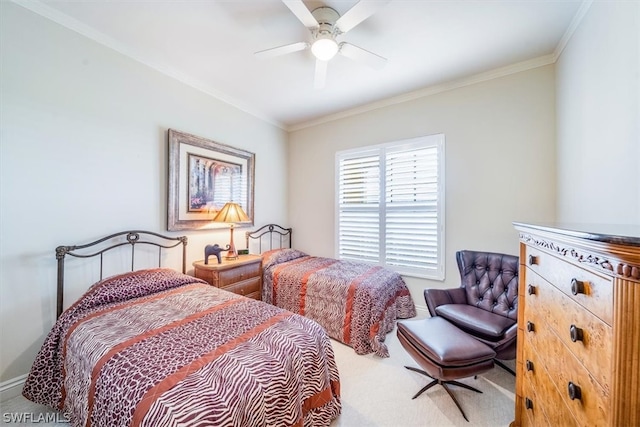 bedroom with ceiling fan and crown molding