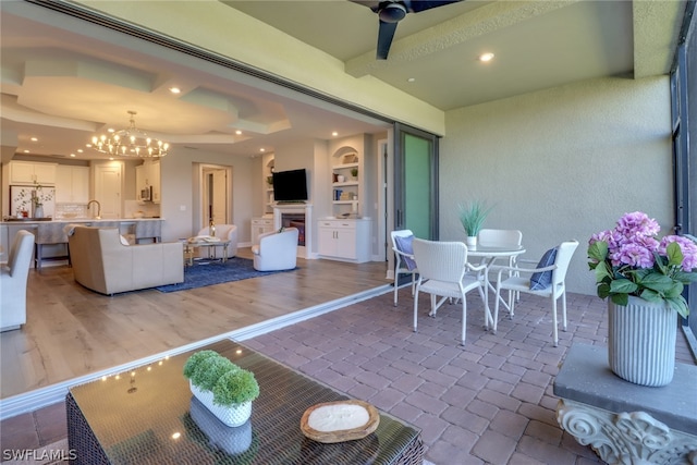 view of patio / terrace featuring ceiling fan