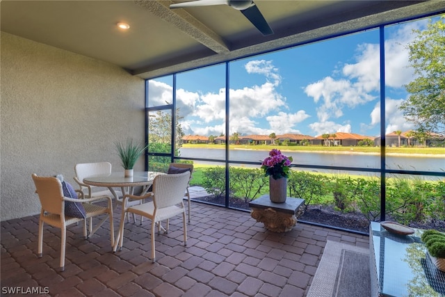 sunroom with a water view