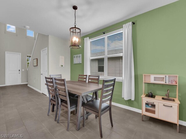 dining area featuring tile flooring