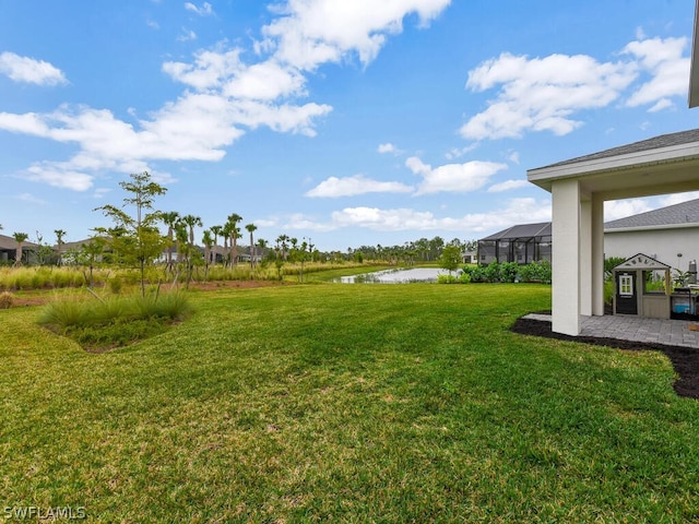 view of yard with a water view