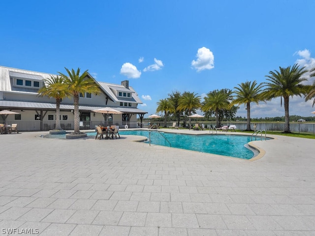 view of swimming pool featuring a patio