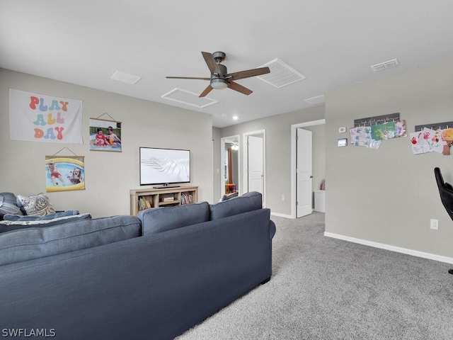 living room with ceiling fan and carpet floors