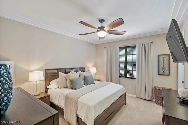 bedroom with ornamental molding, ceiling fan, and light colored carpet