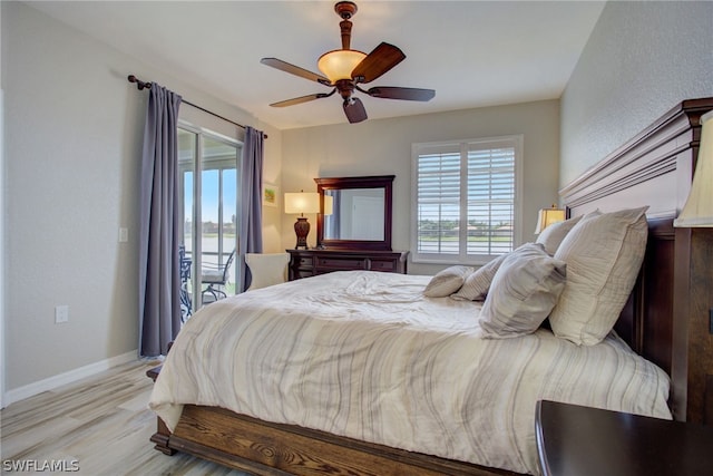 bedroom with ceiling fan, access to outside, light wood finished floors, and baseboards