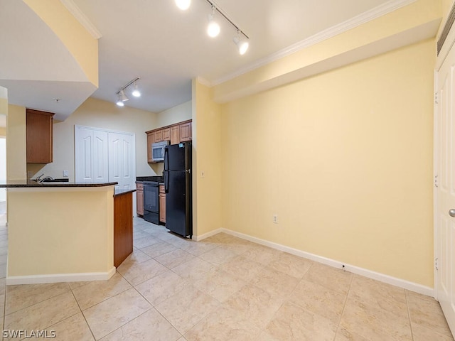 kitchen featuring a peninsula, baseboards, ornamental molding, brown cabinets, and black appliances