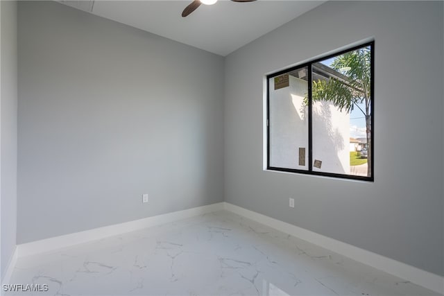 unfurnished room featuring ceiling fan