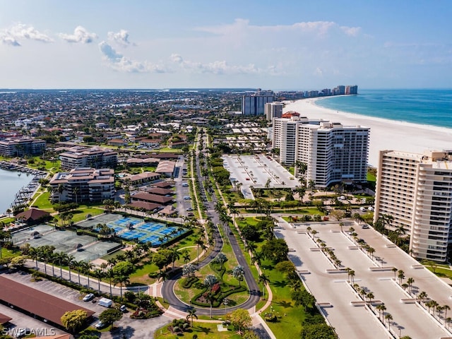 bird's eye view featuring a beach view and a water view