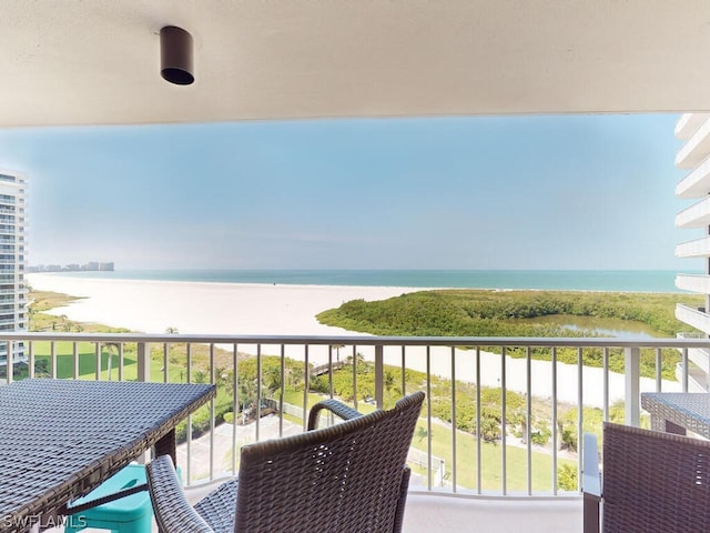 balcony featuring a water view