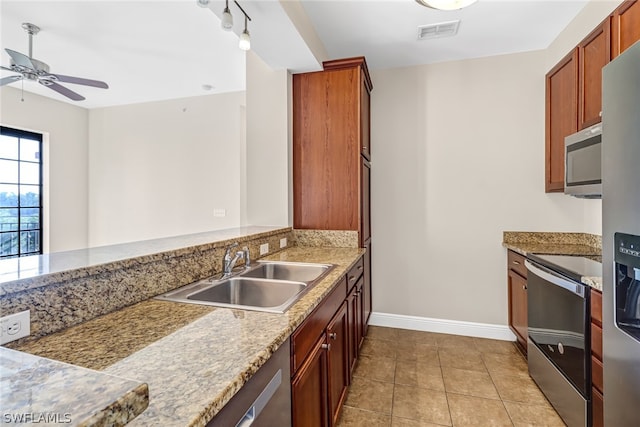 kitchen with sink, ceiling fan, light tile flooring, and range with electric stovetop