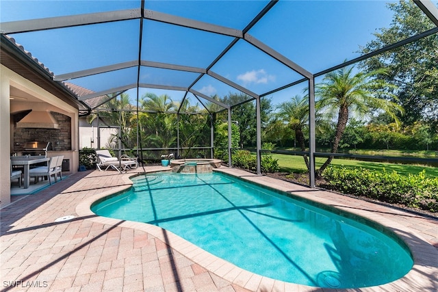 view of swimming pool featuring a patio, a lanai, an in ground hot tub, and a grill