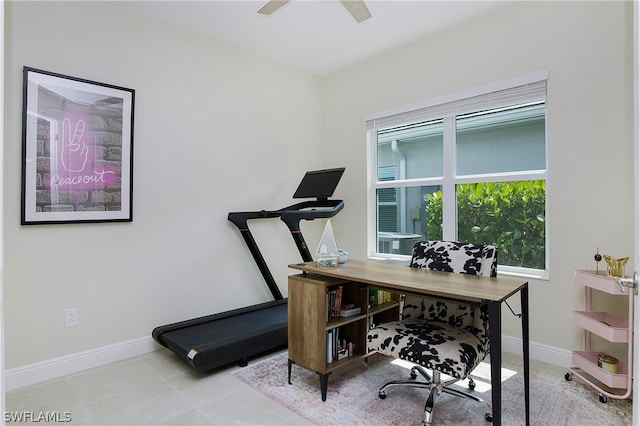 office with ceiling fan and light tile patterned flooring