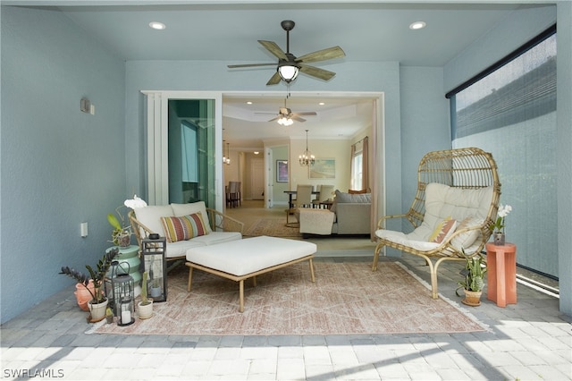 view of patio featuring ceiling fan