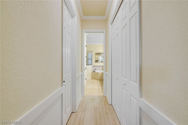 hall featuring crown molding