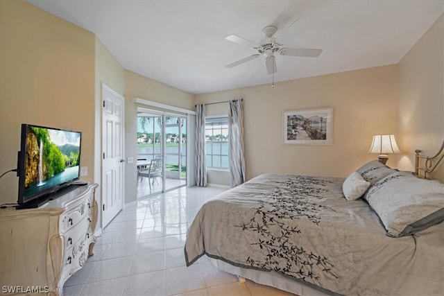 bedroom with ceiling fan, light tile flooring, and access to outside