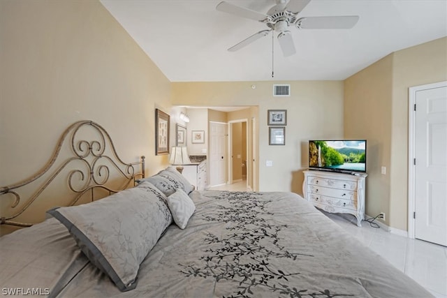 bedroom featuring tile flooring and ceiling fan