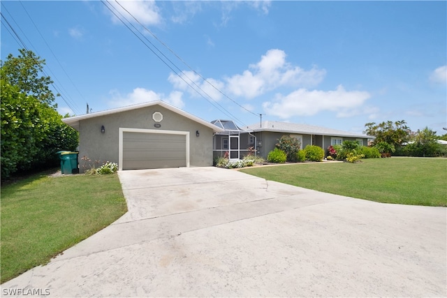 ranch-style house with a garage and a front lawn