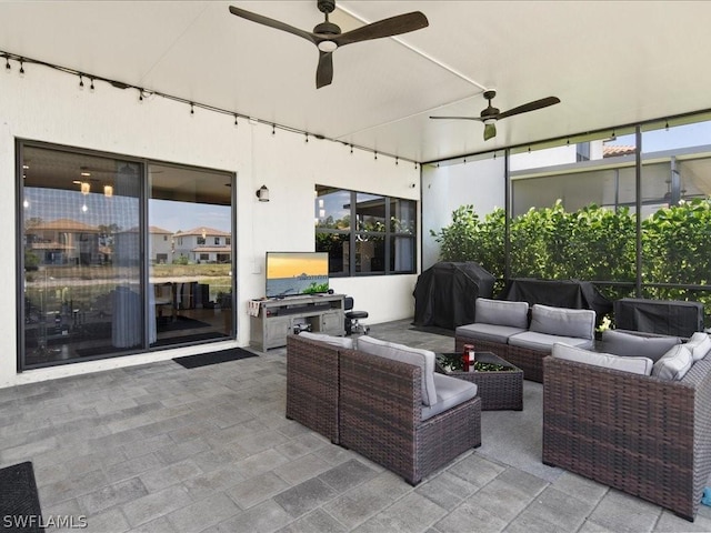 view of patio with an outdoor hangout area, ceiling fan, and grilling area