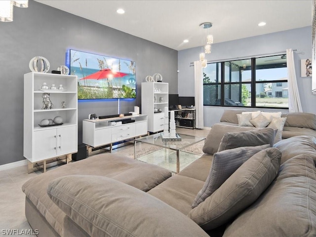 living room featuring a chandelier