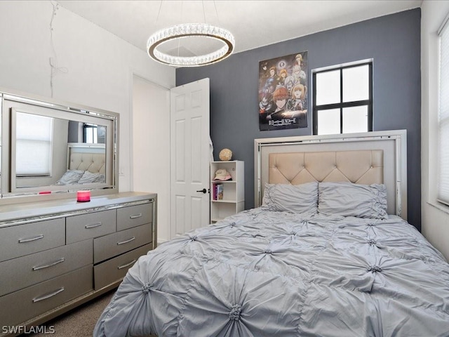 bedroom featuring multiple windows