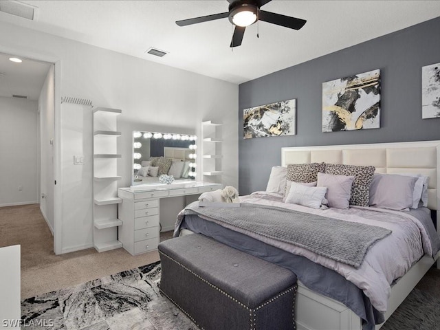 bedroom featuring ceiling fan and carpet floors