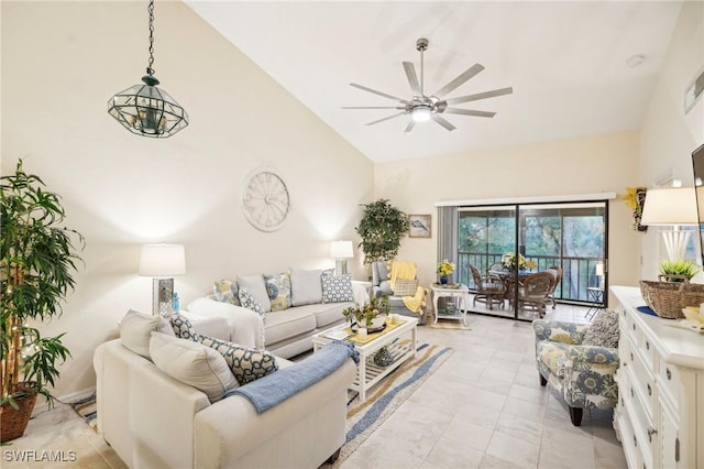 living room with high vaulted ceiling and ceiling fan